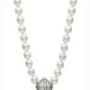 Fresh-water pearl necklace featuring a 10 mm strand with a unique front clasp styled as a miniature handbag design, measuring 45 cm in length.